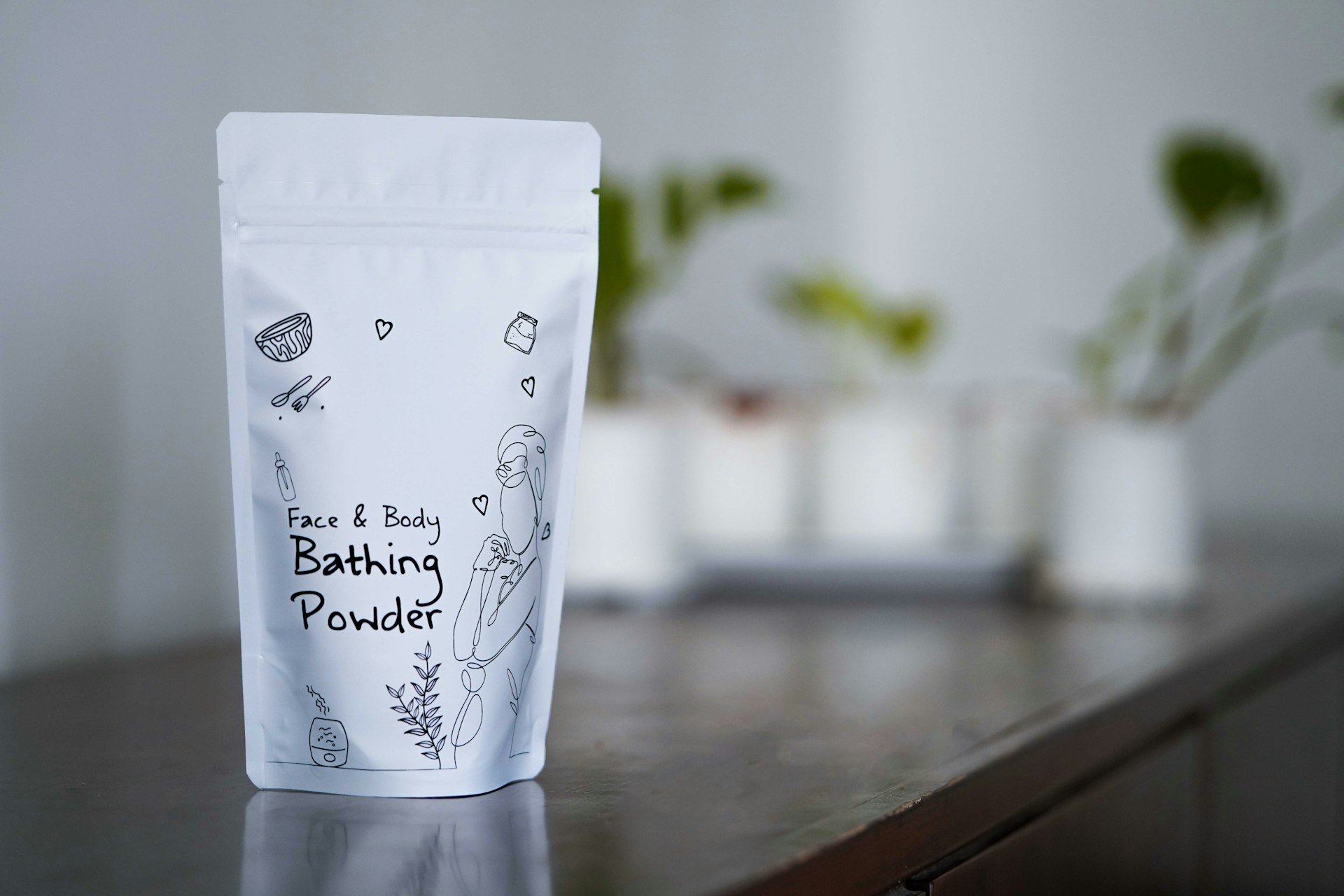 a close up of a bag of face & baby bathing powder on a table