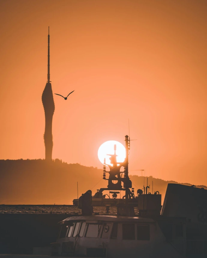 a rocket launching with a sunset in the background